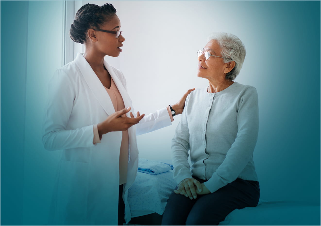 A senior woman having a conversation with her doctor.