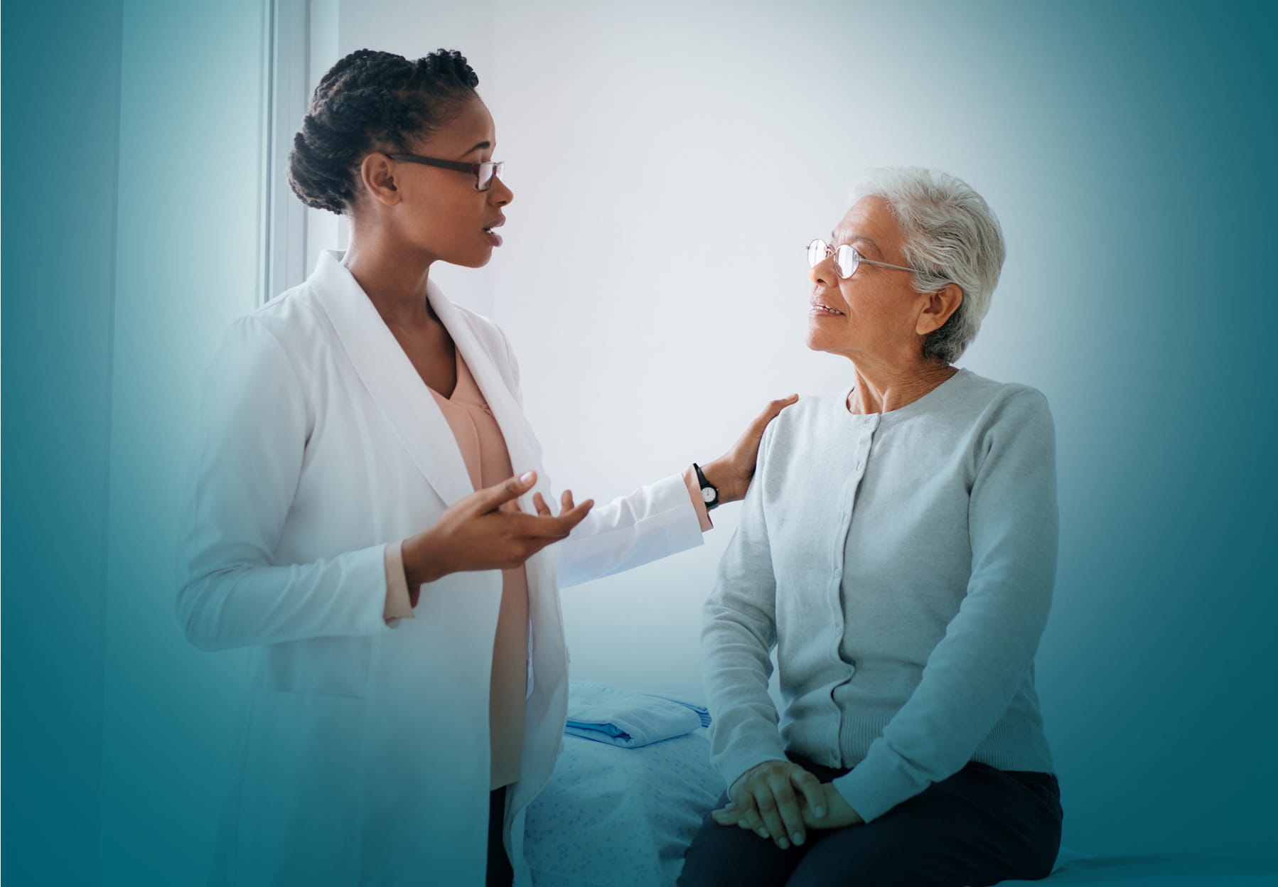A senior woman having a conversation with her doctor.