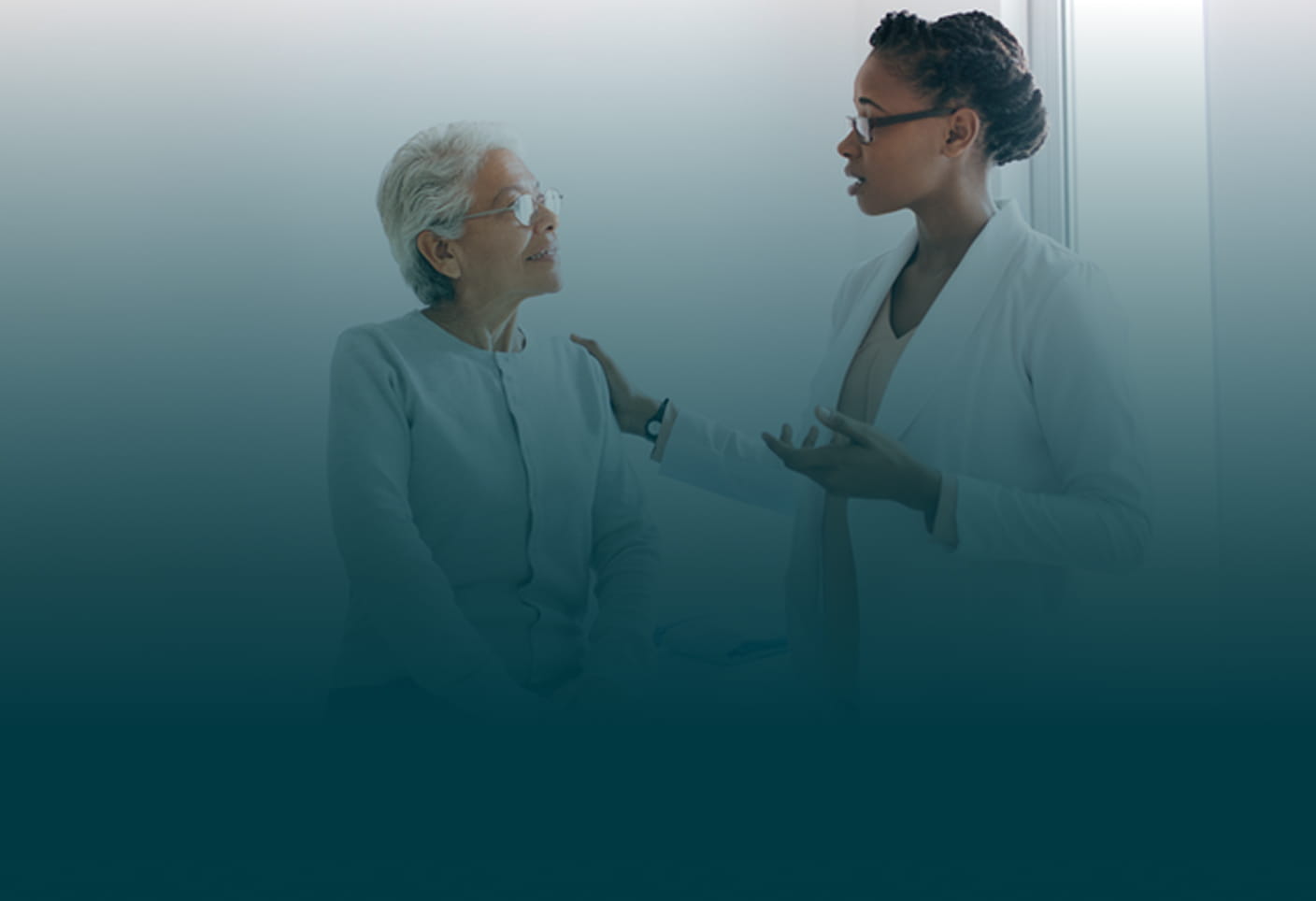 A senior woman having a conversation with her doctor
