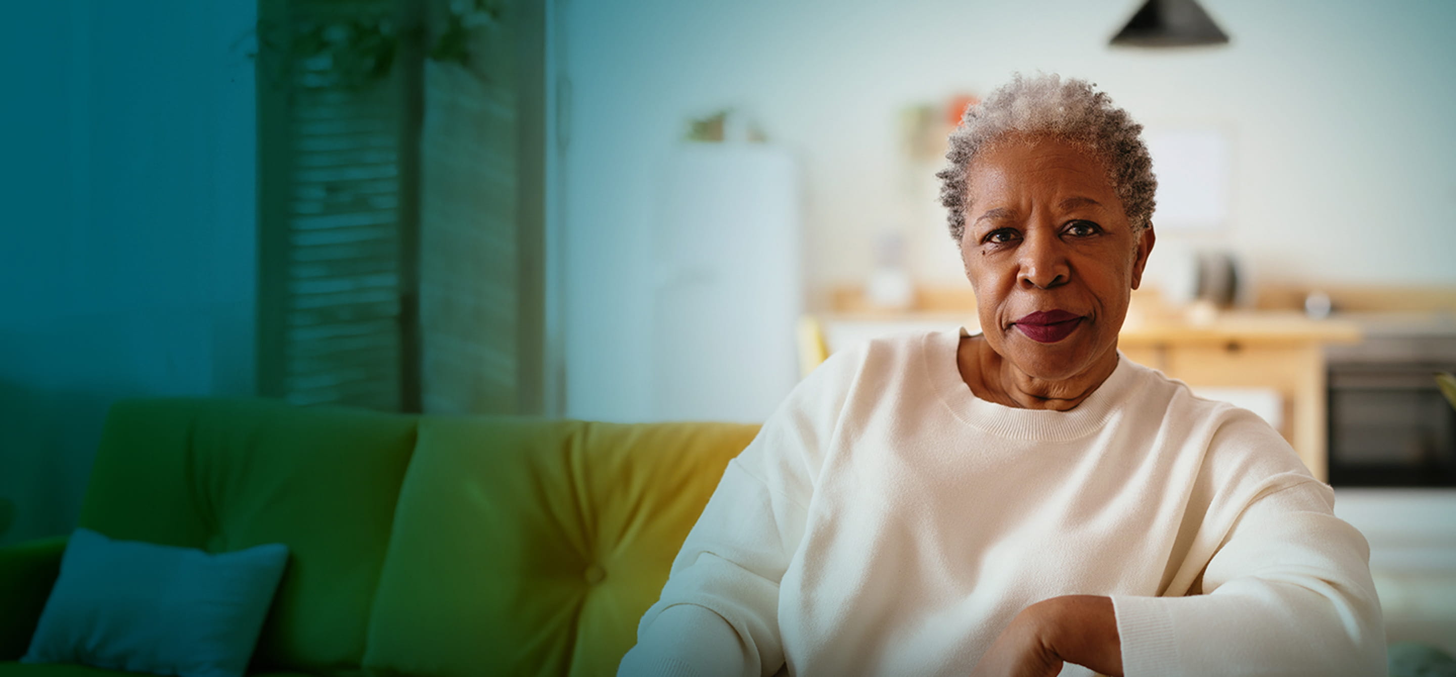 Actor portrayal of an older African-American woman facing the camera with a neutral expression.